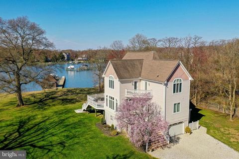 Experience waterfront living at its finest in this meticulously maintained 4-bedroom, 2.5-bathroom home. Boasting over 4, 200 square feet of living space, this property offers the perfect blend of elegance and comfort. Step inside and be greeted by a...