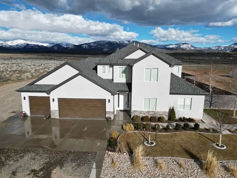 Discover your oasis on 4.86 acres: a 3369 sq ft, 5-bed, 4-bath, custom kitchen, large family room 3 car garage 2-story haven. Complete with a spacious 2100 sq ft workshop, with 5 additional beds, 3 baths, office, and an industrial kitchen. Embrace na...