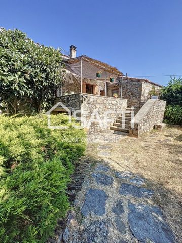 07140: Located on the outskirts of the Vans, CLOSE to shops on foot and in the heart of a flat garden with trees, typical Ardèche stone house of approximately 75m2. This house consists of a living room with wood insert and semi-open kitchen with acce...