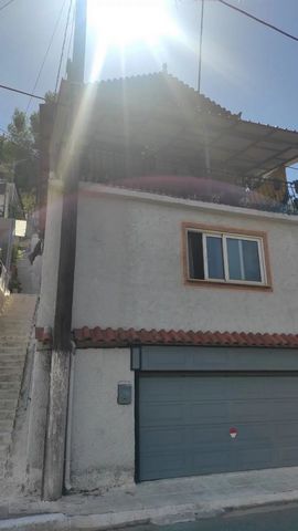 Maisonette 160sq.m. on 3 levels in Aigio 150m from the sea. It has 3 bedrooms, 2 bathrooms, kitchen-living room with fireplace. View to the sea. It has a garage and storage room. Also has a fourth level above the maisonette which serves as a courtyar...