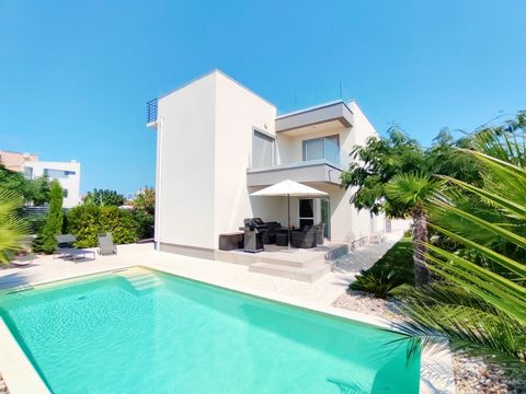 Luxury villa with pool for sale in Privlaka. It is located only 100 m from the sea, and there is a very nice view of the sea. The villa consists of ground floor and first floor and a roof terrace. The ground floor consists of a hallway, bathroom, kit...