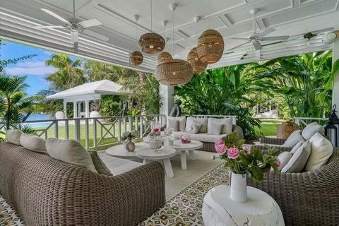 Gadait International is proud to present this exceptional canal-side estate, a true real estate gem that embodies luxury, exclusivity and tranquility. Nestled on a generous 42,690-square-foot lot, this unique property combines timeless island charm w...