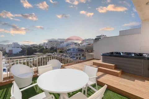 ST JULIANS New to the market and barely lived in newly built and professionally furnished two double bedroom Penthouse. Open plan kitchen dining and living area all designer finished onto a sizable terrace with a 5 person Jacuzzi together with a dura...