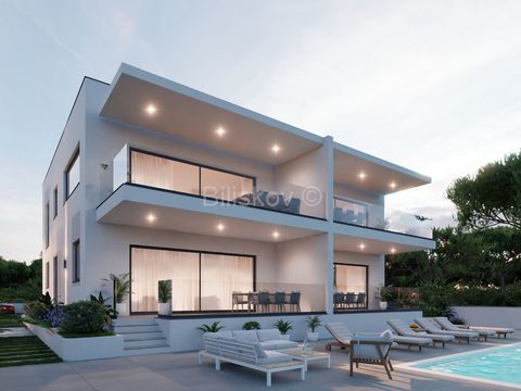 www.biliskov.com ID 14990 Pag, Bošana A luxurious three-bedroom apartment in a new building with a total area of 94.48 m², scheduled for completion by June 2025. The apartment is located on the ground floor of a beautiful two-story urban villa that h...