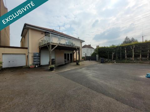 Maison avec garage et terrain constructible