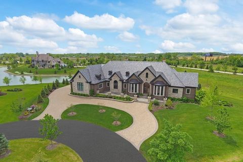 Incredible Custom Estate on a waterfront lot in the prestigious Village Enclave of South Barrington. District 220 schools and only a few miles away from The Aboretum shops, restaurants and entertainment. City water and sewer. Absolutely unrivaled arc...
