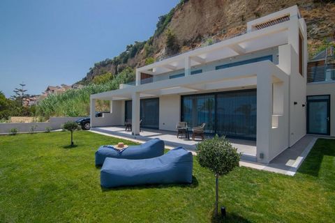 This bright and airy pristine villa with views of the open sea is located at the waters edge on the outskirts of Zakynthos Town – situated within walking distance to amenities and shops. The luxurious residence has been expertly designed by top archi...