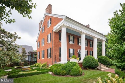 CONSTRUCTION ON BRAND NEW 2ND KITCHEN ON MAIN LEVEL HAS BEEN COMPLETED! Welcome to Smithsonia! This stunning four columned historic landmark located right in the heart of Downtown Fredericksburg is back on the market, and this time with some extremel...
