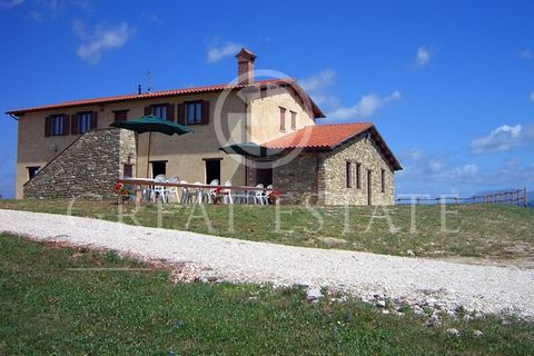 The property, located at 670 meters above sea level, is 7 km away from the historic center of Gubbio, in an oasis of enchanting beauty and tranquility. The property is spread over 14 hectares of land, partly wooded and partly dedicated to crops and h...