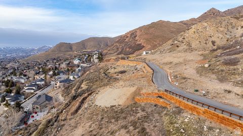 Here's your golden opportunity - your one shot at owning a piece of paradise in Cannon Cove, an exclusive gated community perched high on the east bench of Salt Lake City at the mouth of Parley's Summit. This exceptional lot offers breathtaking views...
