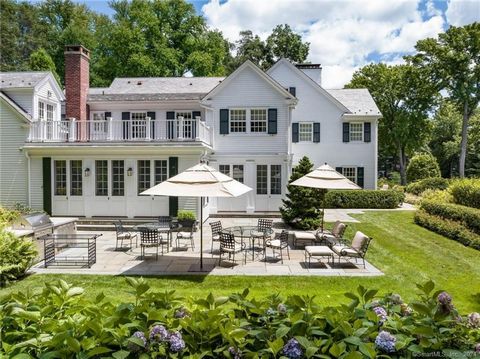The moment you drive into the circular Belgian block courtyard of this beautifully sited 2.5 acre estate within the private Tokeneke Association you have entered a world of your own. A spacious entry hall w/ adjoining library welcomes you to beautifu...