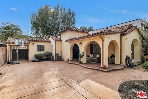 Welcome to a sanctuary where modern enhancements and timeless architecture converge, nestled in the heart of a serene neighborhood. This distinguished home, crowned with a commercial-grade vinyl roof installed three years ago, promises durability wra...