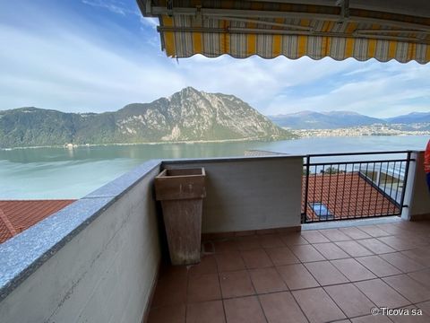 1032I - Ticova Immobiliare offers for sale in Campione d'Italia an elegant apartment fully furnished with a beautiful terrace overlooking the lake. --The apartment is located on the ground floor and consists of entrance hall, living room with kitchen...