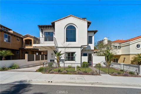 Located in the highly sought after community of North Redondo Beach, this 4 bedroom, 3.5 bath stunning coastal contemporary Spanish style residence is the perfect place to call home! This custom-built 2,722 sq ft Palmer Development home features an o...