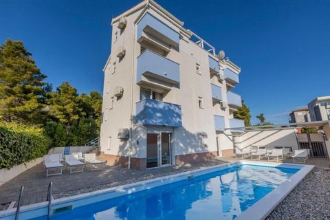 Attractive apart-house with 8 apartments located 400 meters from the sea and wonderful pebble beach in the small tourist town of Podstrana, 8 km from Split! Podstrana has recently become a super-prestigious suburb of Split with luxury villas and apar...