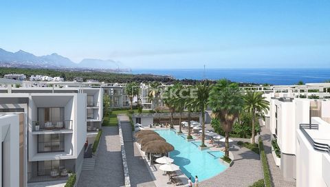 Apartamentos com vista para o mar perto de campos de golfe em Karagach, Girnë, Chipre do Norte Chipre, a ilha paradisíaca do Mar Mediterrâneo, é o país onde você pode viver sua vida como um feriado com seu clima ensolarado 300 dias por ano. Localizad...