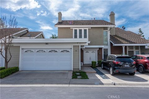Welcome to 18 Woodland, a stunning upgraded home in Woodbridge Community. This 2-story attached SFR features 3 bedrooms upstairs and 2.5 bathrooms and offers 1,650 sq ft of comfortable living space. Step inside to the open floor plan with beautiful e...