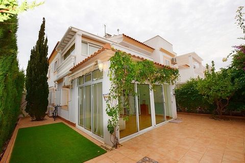 4 bedrooms semidetached villa in Playa Flamenca . Semi-detached house with 4 bedrooms and 2 bathrooms in Playa Flamenca. This house is distributed over two floors with a private corner garden facing east. On the ground floor we have a large living-di...