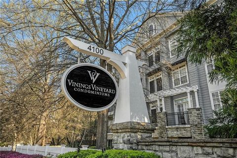 Welcome to this charming Vinings condo in the secure, gated community of Vinings Vineyard! Enjoy an Atlanta address with Cobb taxes, and all the area has to offer, from downtown Vinings to Cumberland Mall, the Galleria, to The Battery! Enjoy a surpri...