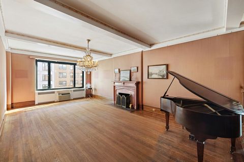 This spacious residence has the charm of the prewar building with all the preserved details, beamed high ceilings, beautiful hardwood floors, steel door frames. A gracious entry gallery leads to a sunken living/dining room with the original sandstone...