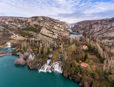 Inside the Krka National Park, a detached house with a total usable area of 150m2, on a plot of 10.000m2, located next to the Roški waterfall. It consists of a kitchen with a dining room and a living room, 5 bedrooms and 3 bathrooms, two of which are...