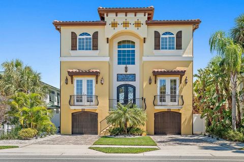 Exceptional design, construction, and quality finishes are the hallmarks of this stunning Mediterranean-inspired residence in the coveted community of Pass-a-Grille. Offering the best of both worlds, the home is located steps away from an uncrowded s...
