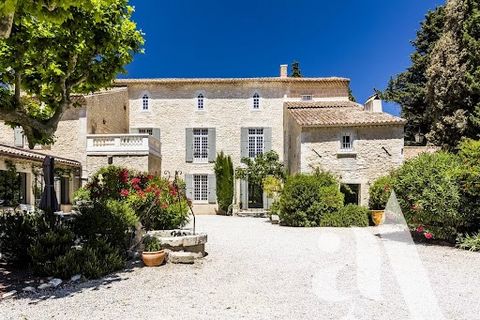 For sale in Aramon. Between Villeneuve-les-Avignon and Saint-Remy-de-Provence and 10 minutes driving from TGV station. Historic 18th century house renovated with great care and taste. It is articulated in fifteen main rooms on a living area of more t...