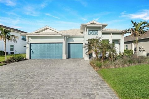 This beautiful home, located in Azure at Hacienda Lakes, features a heated saltwater pool on a private preserve lot. Enjoy Florida’s weather on the expanded, screened lanai with expansive outdoor space complete with a living area and pre-plumbing for...