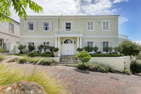 Step into this classic, European-inspired home, nestled amidst breathtaking views of the best Cape Town has to offer, and discover the perfect canvas for your dream family living space. As you enter through the grand double doors, you're greeted by p...