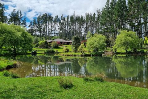 Private and Picturesque Hidden Valley A well formed driveway leads you to a beautiful lifestyle property enhanced with mature trees, water lilies, ponds and paddocks and the tranquility of the birdsong. An impressive residence, built with rustic coun...