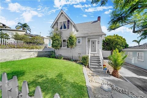 Introducing an enchanting Victorian-style gem with ocean views and just a leisurely stroll from the beach. This two-story home features three bedrooms and two baths, radiating charm with its classic hardwood floors and cozy fireplace. The main level ...