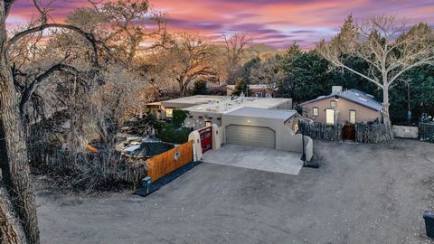 Truly expert design of the restoration of this adobe home with a detached 2 bedroom casita. Home features 3218 square feet with open concept living area featuring a custom plaster fireplace and wood beamed ceiling. Main home has an office, three bedr...