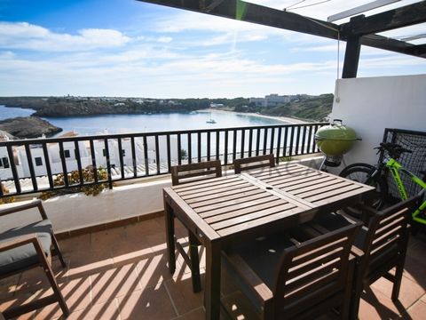 A duplex apartment with spectacular views over one of the island's most famous beaches. Through an independent entrance, we enter the ground floor, on two levels, and arrive at the kitchen that connects to the dining area, which is elevated looking o...