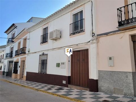 Beautiful 350m2 build 4 bedroom, 4 bathroom Townhouse centrally located in Teba in the province of Malaga, Andalucia Spain. The property has a large entrance hall that opens in to a central reception room with stairwell and on to a front room that th...