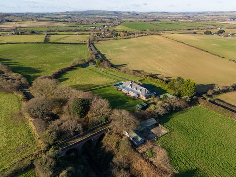 This large and contemporary detached house certainly lives up to its name as there are truly stunning views from every direction as far as the eye can see. The property nestles in the midst of 5.9 acres of grounds and paddocks and includes a block of...
