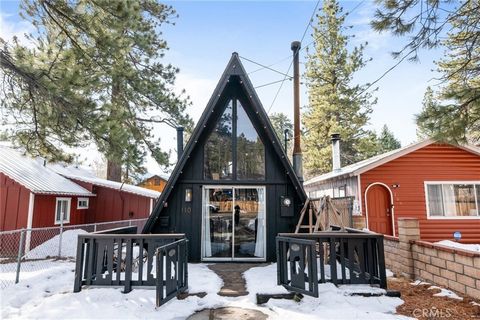 Welcome to your dream mountain retreat in the heart of Big Bear's enchanting Peter Pan area! This modern and stylish A-frame is the epitome of cozy elegance, boasting tasteful upgrades that elevate the mountain living experience. As you step inside, ...