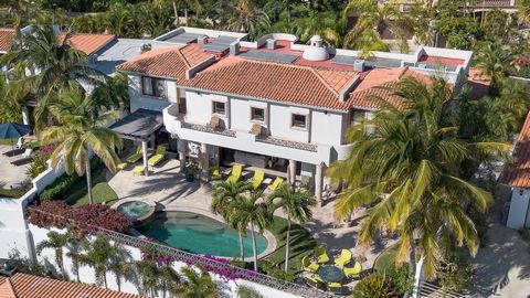 Welcome to this stunning single family residence in the prestigious La Jolla community of San Jos del Cabo. This exquisite home offers an open concept design that seamlessly integrates the living dining and kitchen spaces creating an inviting atmosph...