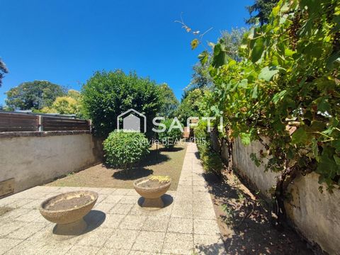 Maison de ville avec beau jardin