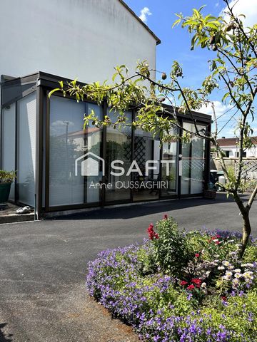 Coup de coeur assuré : maison avec véranda et garage dans un secteur très recherché.