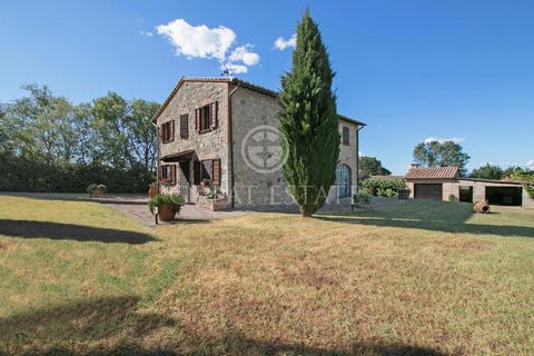 Among the green hills of the Tuscan countryside, a few kilometres from the historical centre of Sarteano, you will find Casa delle Anfore, a charming farmhouse of 264 sqm on two levels and disposed as follows. On the ground floor, a spacious portico ...