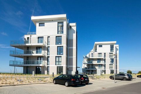 Appartamento moderno e confortevole con vista sul Mar Baltico e sul porto turistico. Goditi la splendida vista panoramica sul Mar Baltico dalla mattina alla sera. L'appartamento moderno e arredato in modo confortevole è composto da una cucina-soggior...