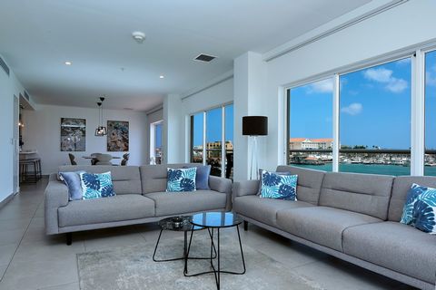 Nestled in the heart of downtown on our vibrant Happy Island is this gorgeous corner condominium in Harbour House which offers unparalleled ocean and harbor views. This stunning two-bedroom condo is designed to provide a haven for both comfort and so...