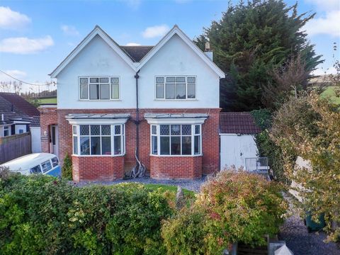 Backing onto farmland with views across the surrounding countryside as far as the eye can see, is this spacious four-bedroom detached family home. Originally built in the 1920s it has been sensitively modernised but still retains some delightful peri...