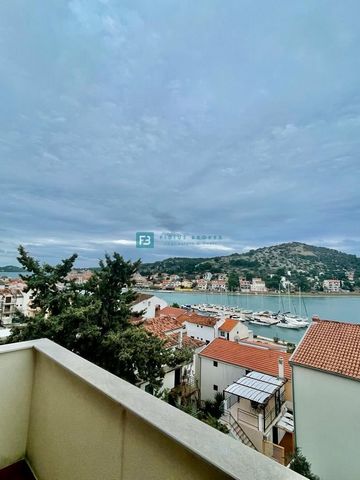 Location: Šibensko-kninska županija, Tisno, Tisno. TISNO - For sale, a nicely furnished house with apartments and a spacious yard, located on the 3rd row from the sea! The house is located in an attractive location, 70 m from the sea. This furnished ...