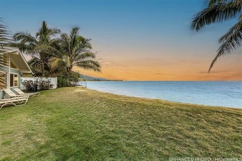Today is the day you fall in Love!! Discover your own piece of Hawaiian paradise with this charming 3-bedroom, 2-bathroom beachfront home. Bask in the beauty of the Pacific Ocean from the comfort of your living room or step onto the sandy shores for ...