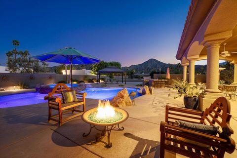 Welcome to the epitome of desert living. This exceptional updated estate home offers space to roam both inside and out. With fantastic views of the awe-inspiring desert mountains, it is fully landscaped including night lighting, and walled and gated ...