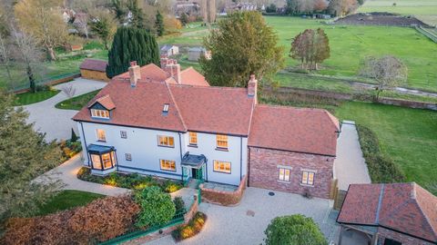 Welcome to an extensively renovated Grade II listed Georgian farmhouse of 5371 sq. ft. having historical roots dating back to the 1100's and a principal structure originating in 1565. Seamlessly integrating historical charm with contemporary technolo...