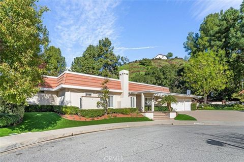 Great opportunity to create your dream home! Nestled in the heart of Calabasas Park on a tranquil cul-de-sac, this beautifully maintained 3,897 sf gem boasts 4 bedrooms, 3.5 baths plus 2 additional large bonus rooms that have endless possibilities! T...