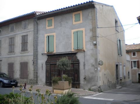 On the main axis of a village with all shops Large village house with old commercial premises and terrace Ground floor: Hall, commercial premises, living room, laundry room, bathroom. 1st: dagiment, living room with new fitted kitchen, bathroom, two ...