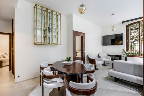 Paris 8th charming bright 2 bedroom pied a terre A few steps from avenue Montaigne and the Plaza Athenee, charming 65 m2 pied a terre on the ground floor of an elegant secured freestone building opening onto a lovely landscaped garden. Meticulously r...